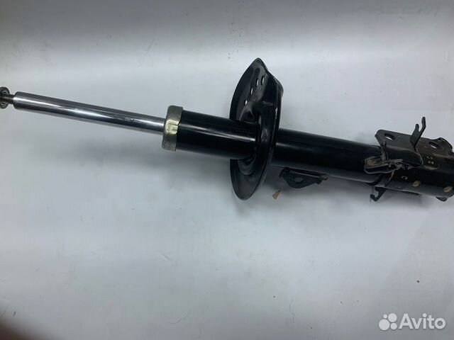 Стойка амортизатора передняя левая Nissan Juke F15