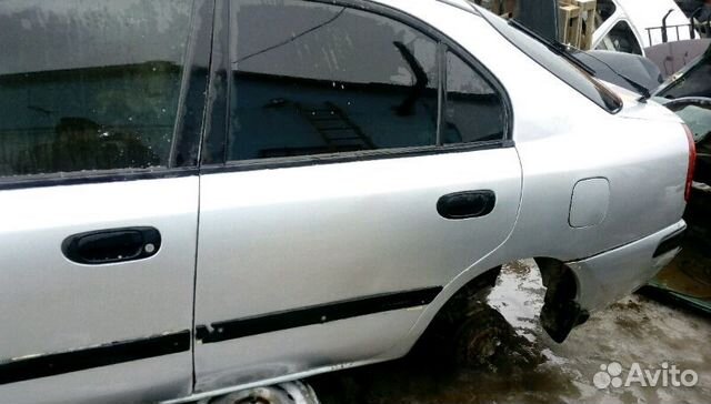 Дверь задняя левая для Mitsubishi Carisma (DA) Дверь задняя левая для Mitsubishi Carisma (DA)
