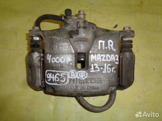 Суппорт передний правый Mazda 3 13-16г 9465