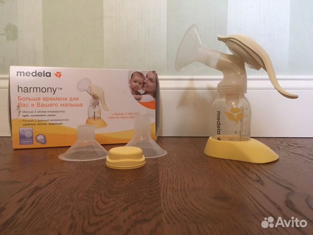 Молокоотсос ручной Medela с насадками Молокоотсос ручной Medela с насадками