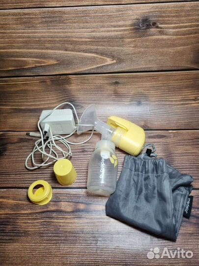 Молокоотсос medela электрический