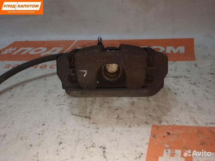 Суппорт тормозной задний левый Nissan X-Trail