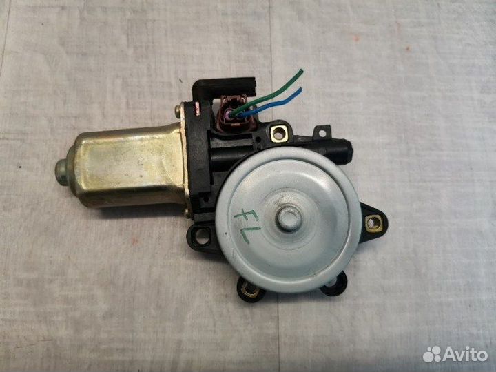 Моторчик стеклоподъемника передний левый Nissan