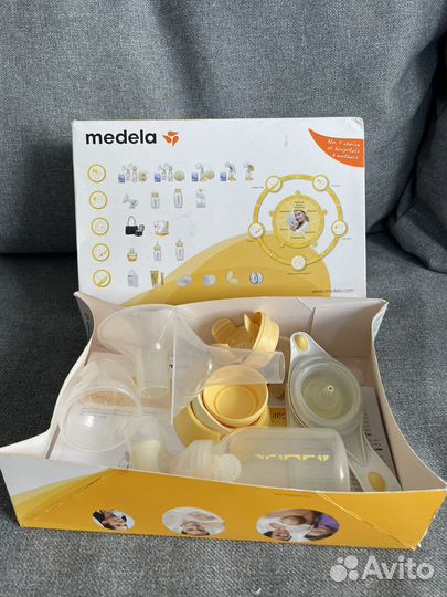Молокоотсос medela ручной + бутылочки