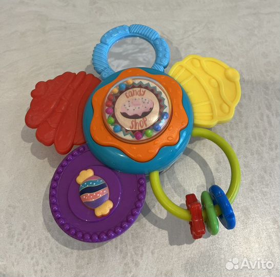 Погремушка цветок на липучке с прорезывателем