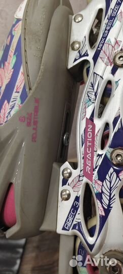 Роликовые коньки