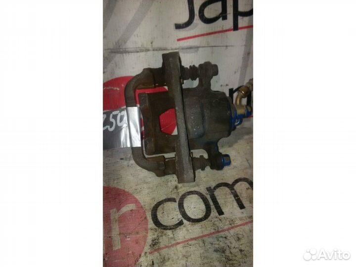 Суппорт тормозной задний правый Nissan Murano