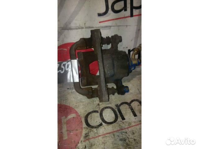 Суппорт тормозной задний правый Nissan Murano