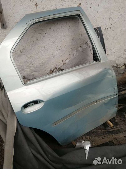 Дверь задняя правая рено логан 1