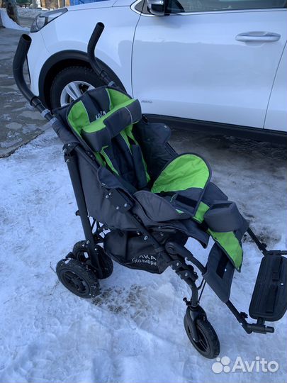 Коляска для детей с дцп