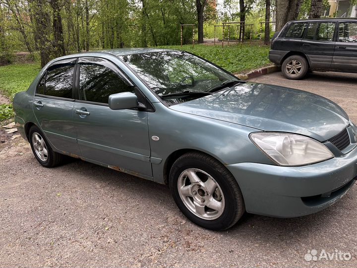 Mitsubishi Lancer 1.6 МТ, 2006, 245 000 км