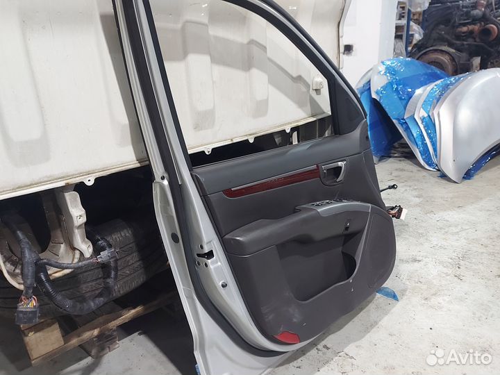 Дверь лева передняя Santa Fe 760032B010 2005-10г