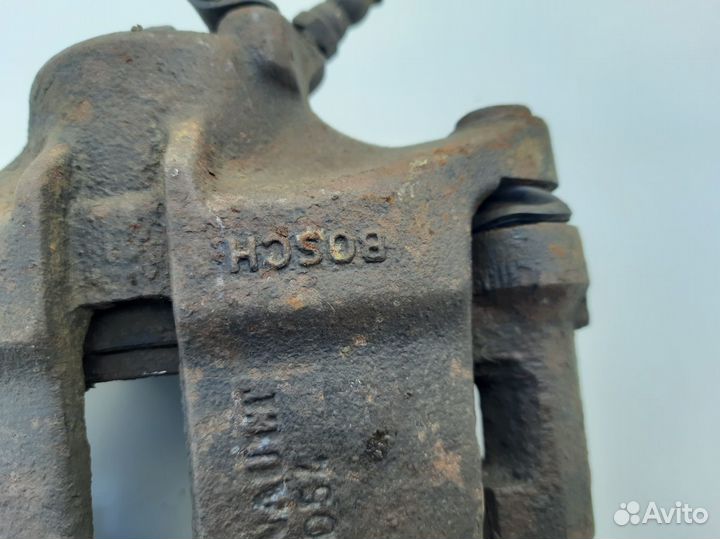 Суппорт передний левый Renault Kangoo 97-03