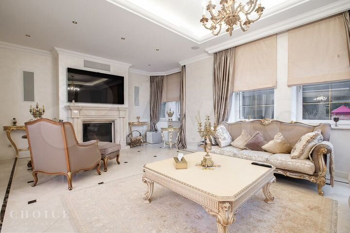 Коттедж 712 м² на участке 12 сот.