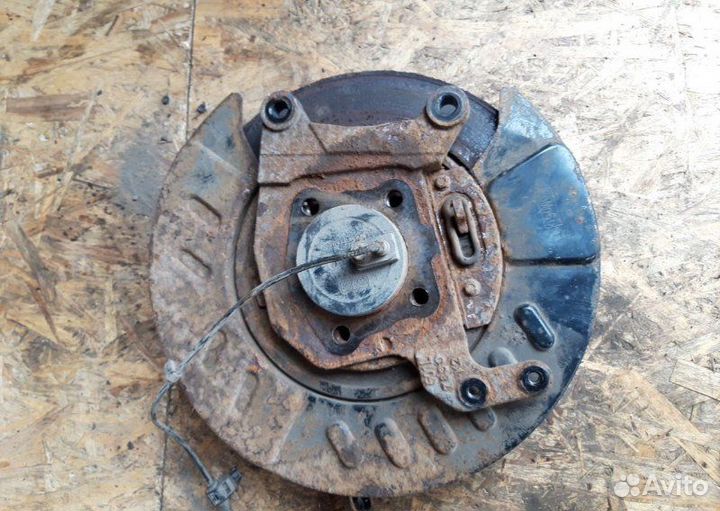 Кулак задний левый Mazda Cx-7 2.3 AT