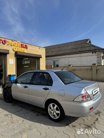 Mitsubishi Lancer 1.6 МТ, 2003, 124 525 км