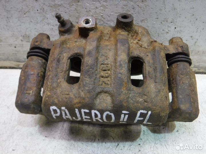 Суппорт передний левый Mitsubishi Pajero 2