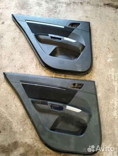 Обшивка задней левой двери Geely Emgrand EC 7