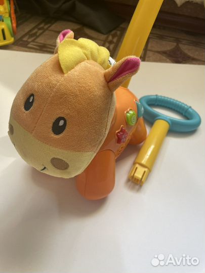 Игрушка каталка с ручкой
