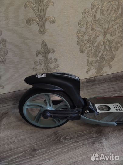 Самокат взрослый Reaction