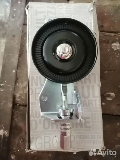 Натяжной ролик ниссан