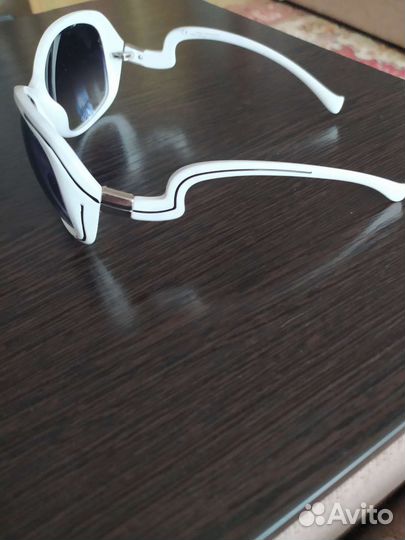 Солнечные очки женские