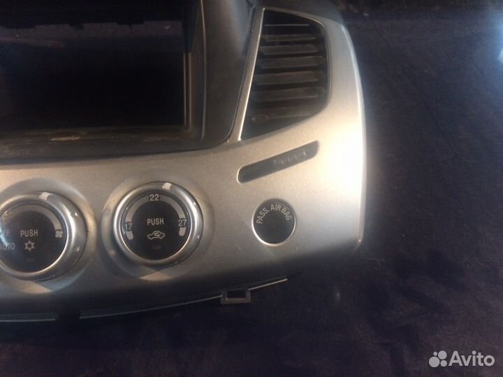 L200 средняя консоль