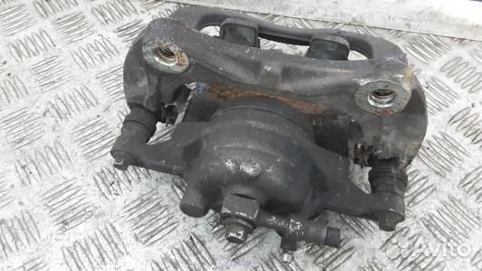 Суппорт тормозной передний левый chevrolet trax (9