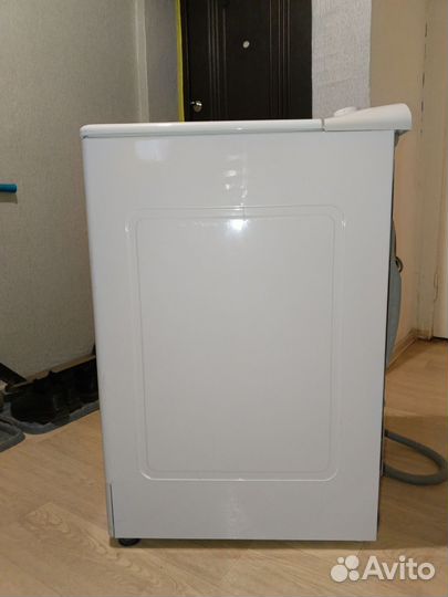 Стиральная машина Канди с вертикальной загрузкой