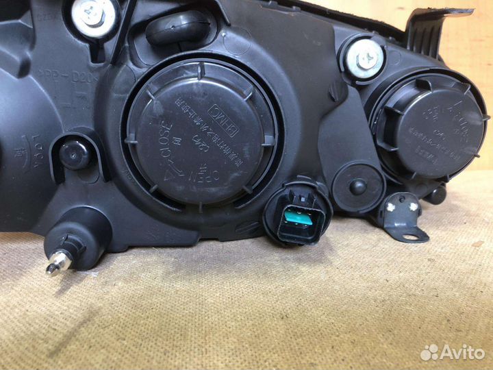 Фара левая Hyundai Elantra XD (03-10г) рест М/К