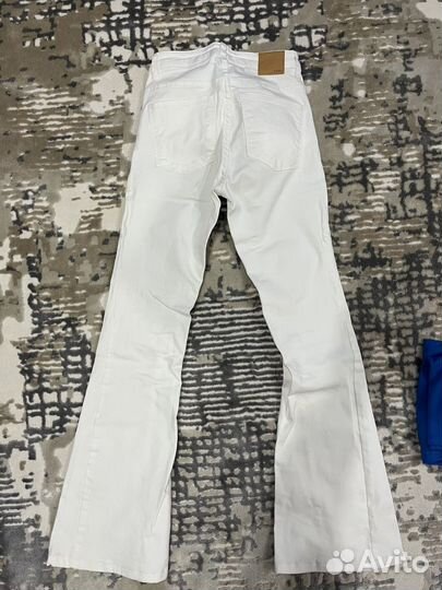 Джинсы клеш