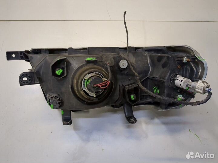 Фара (передняя) Mitsubishi Montero Sport / Pajero