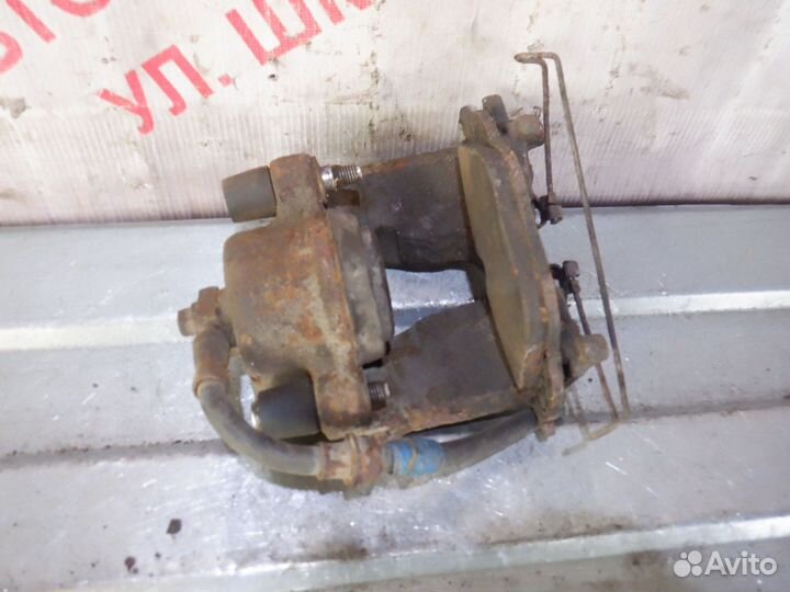 Суппорт передний левый Опель Астра Г