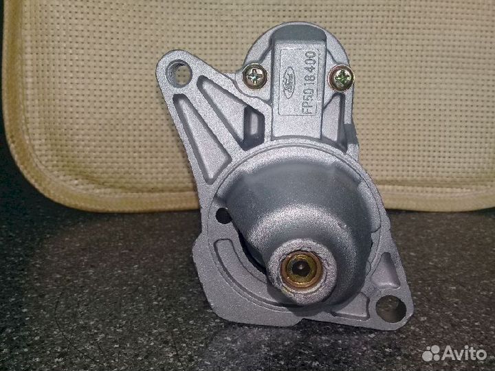 Стартер Новый не оригинал Mazda Protege FP5018400