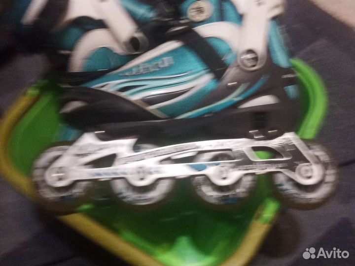 Роликовые коньки