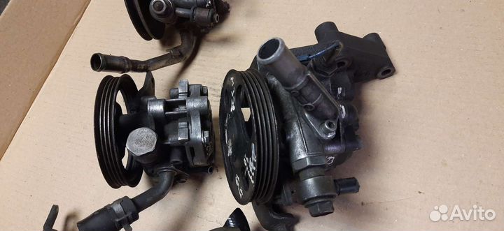 Насос гур Мазда 323 разные