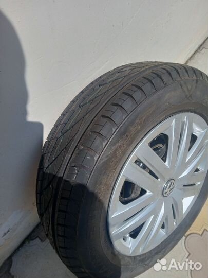 Резина с диском и 2 колпака на volkswagen новое
