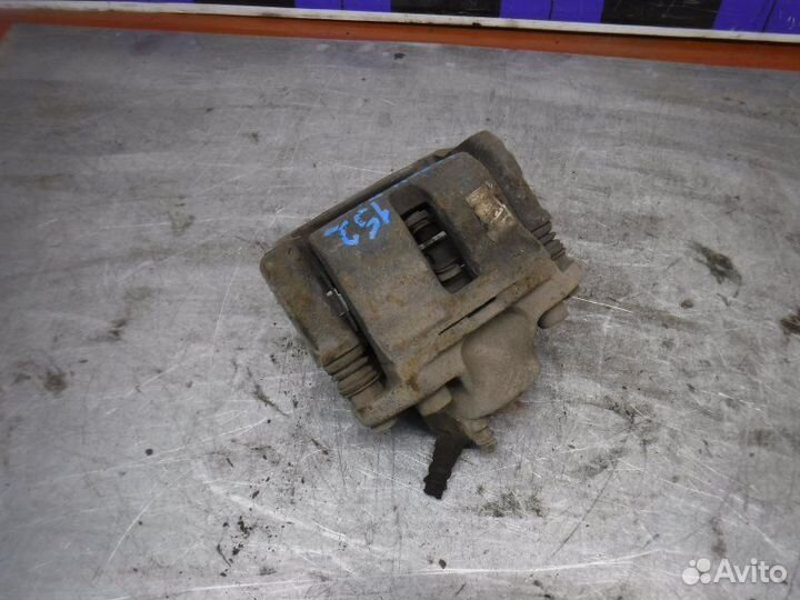 Суппорт передний левый Renault Logan K7M 2006