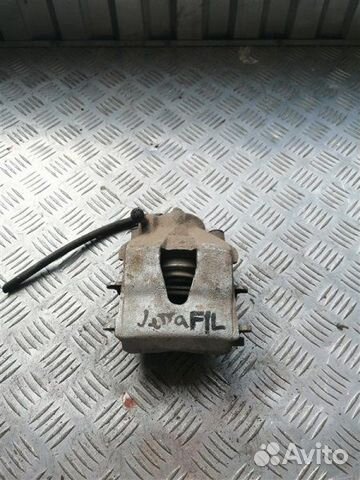 Суппорт тормозной передний левый Volkswagen Jetta