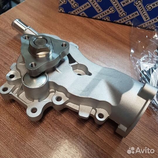 Насос водяной Opel Astra J 1.4, Corsa D