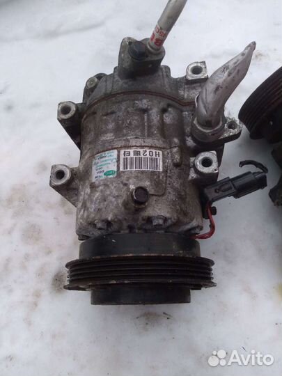 Компрессор кондиционера kia