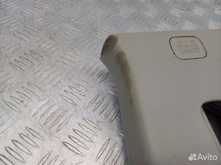 Обшивка стойки центральной правой Nissan Navara