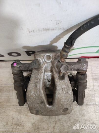 Суппорт задний правый Toyota Avensis T25 2AZ-FSE