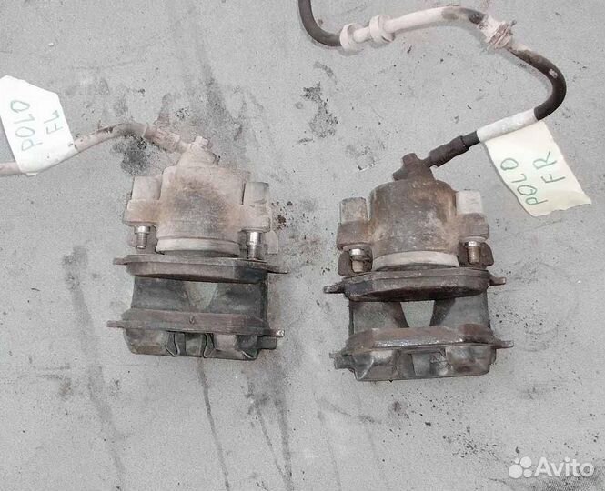 Суппорт передний VW Polo 04г 1.4 16кл