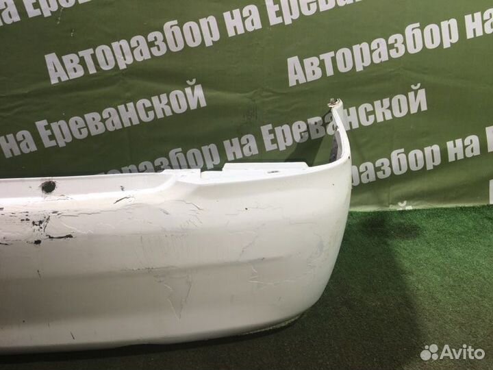 Бампер задний Mazda Familia BJ ZL 1999