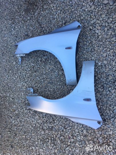 Mitsubishi lancer 10 переднее крыло