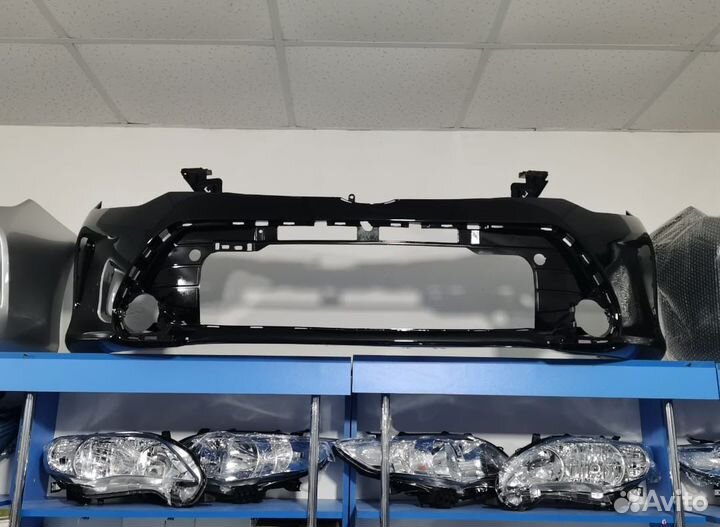 Бампер Toyota Camry 55 черный 218