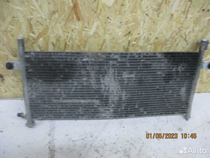 Радиатор кондиционера Ниссан NP300 (2010)