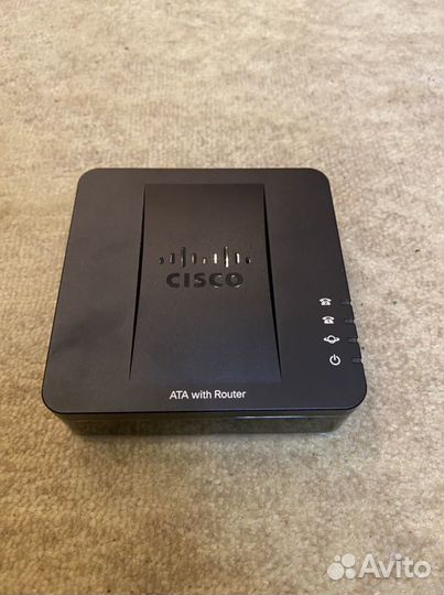 Адаптер для VoIP-телефонии Cisco SPA122