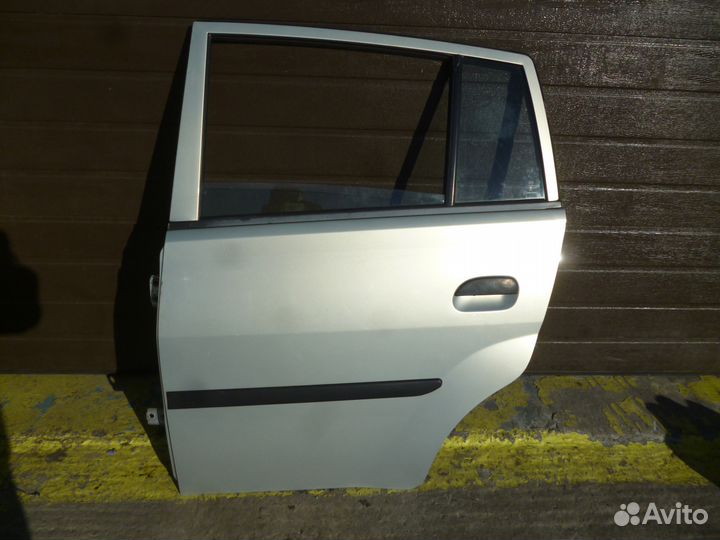 Дверь задняя левая Daihatsu mira, L250